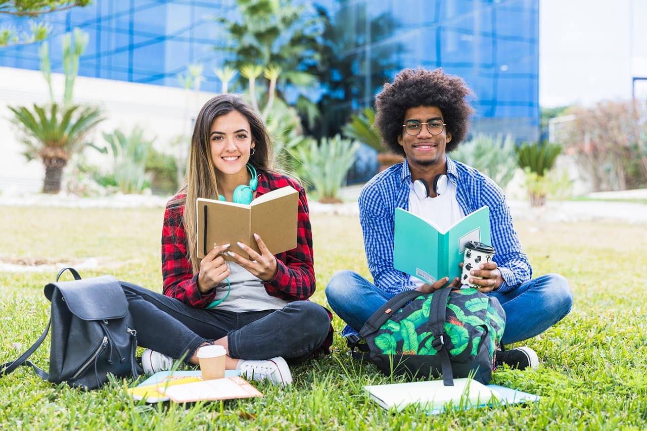 International students chatting outside on campus