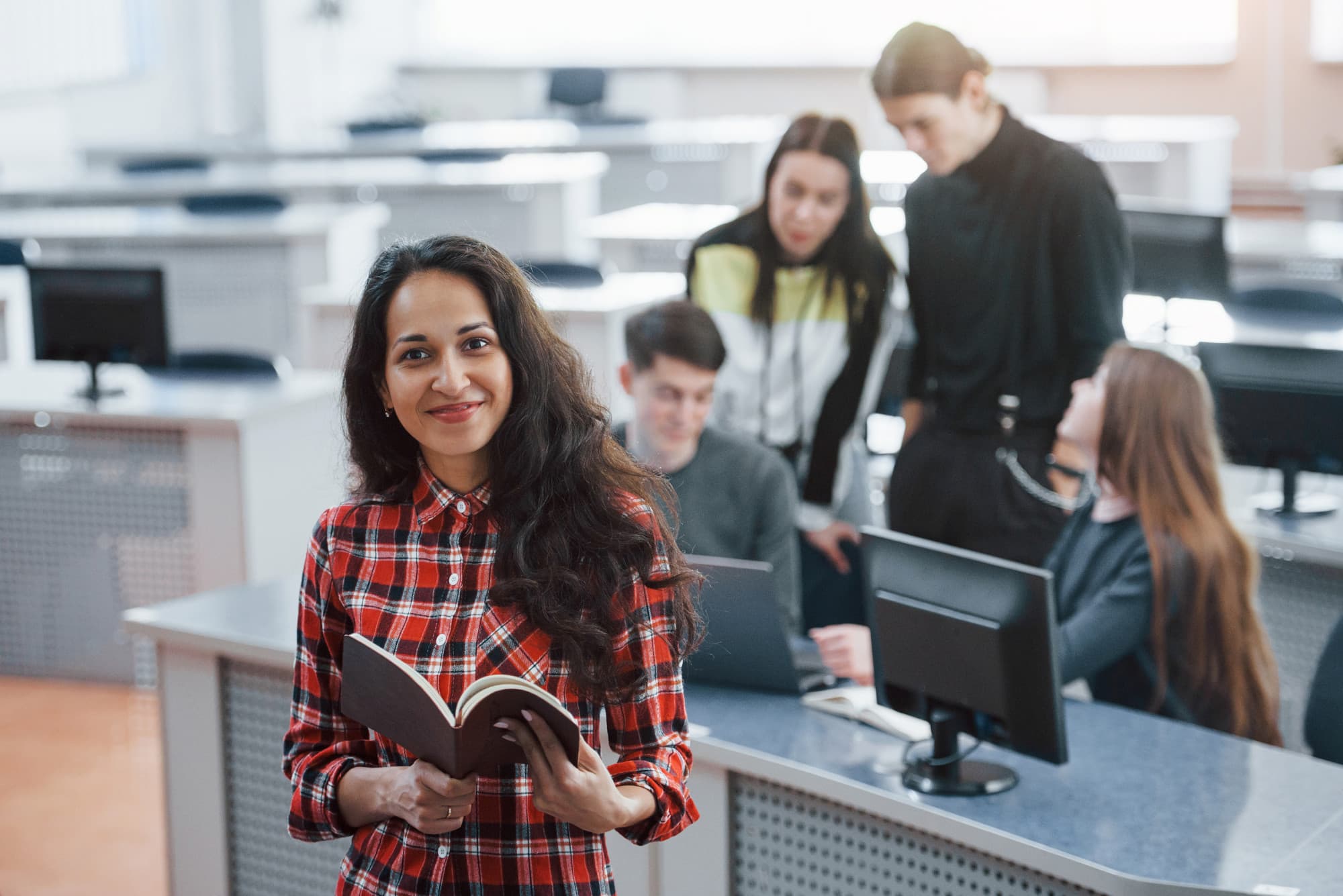 Smiling student in a university library